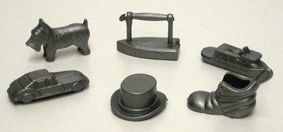 The grey plastic version of the original metal tokens.